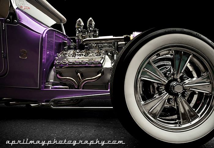 Purple hot rod, dramatic engine and wheel close-up