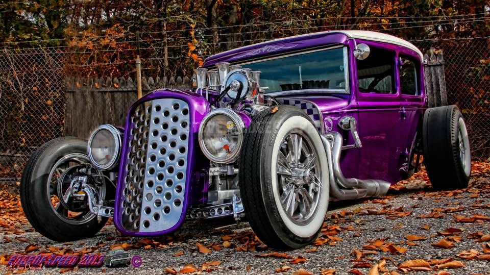 Purple chopped Model A sedan in autumn leaves