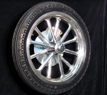 Radir 12 Spoke Spindle Mount wheel, Full Polish finish, mounted with tire